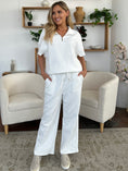 Load image into Gallery viewer, Double Take Full Size Texture Half Zip Short Sleeve Top and Pants Set
