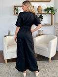 Load image into Gallery viewer, Double Take Full Size V-Neck Tied Side Slit Jumpsuit
